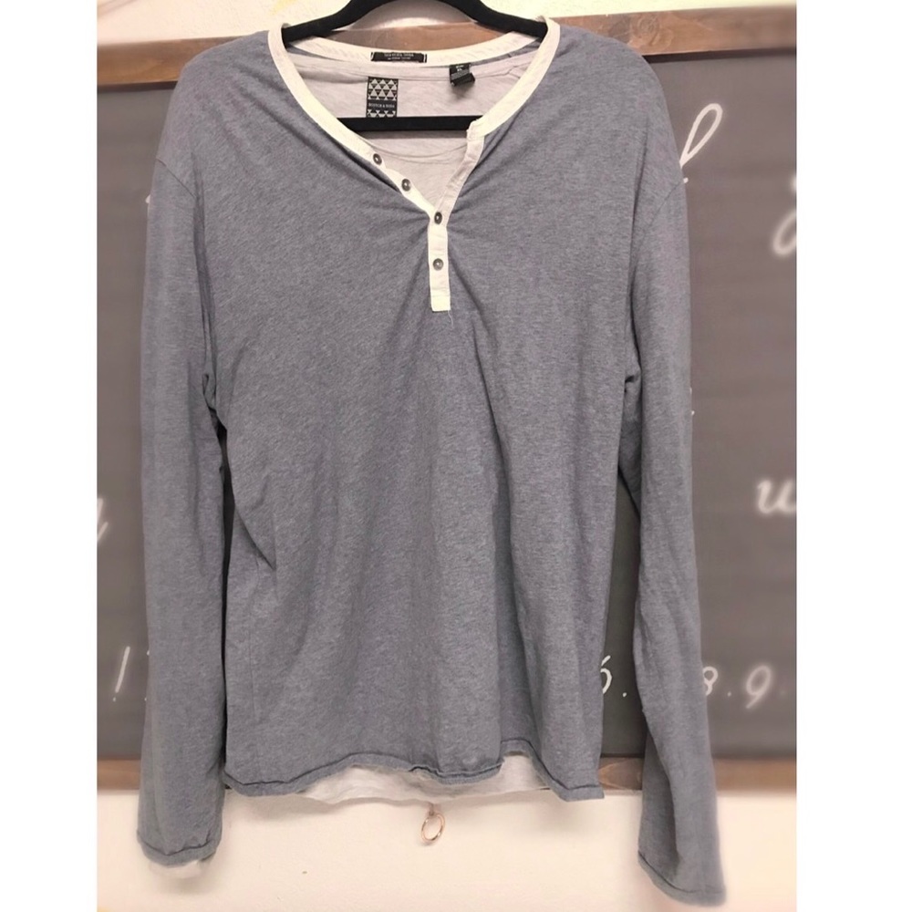 men’s blue long sleeved shirt